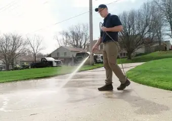 A man doing pressure washing service