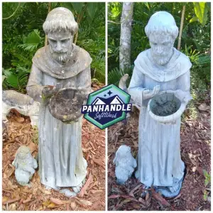 Concrete statue before and after pressure washed.